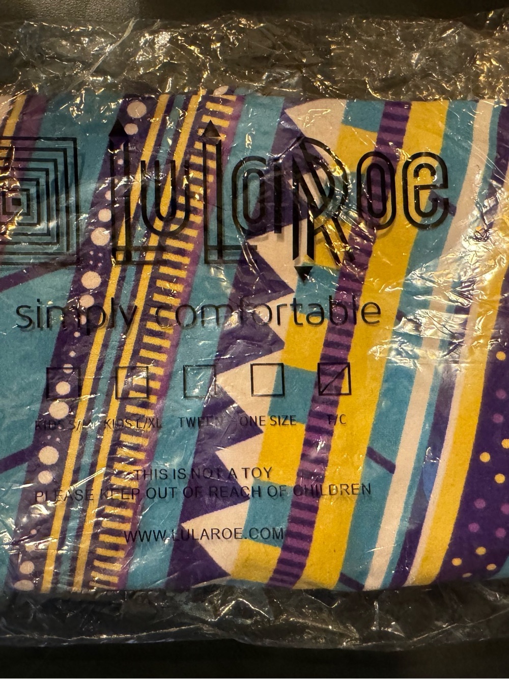 LuLaRoe new  Multicolor Striped Leggings - teal, Yellow & Purple tall & curvy